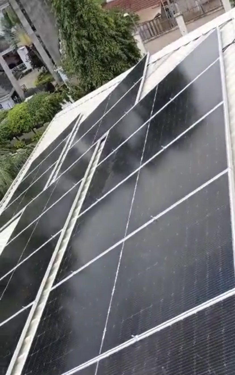 Solar PV array installation viewed from the roofline